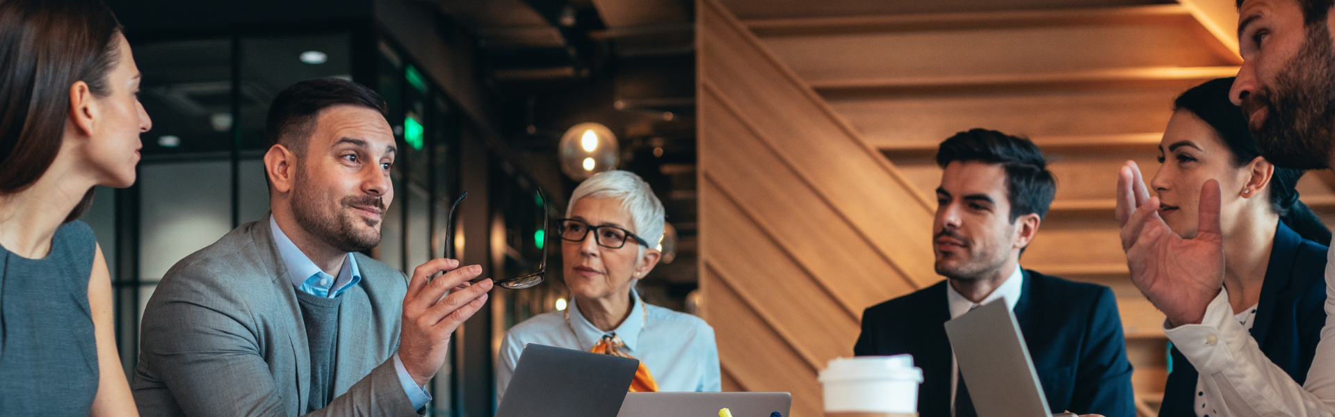 Group meeting people in coffee shop