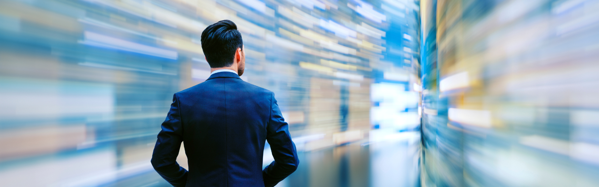 business man in corridor blurred background