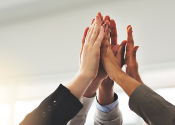 group of hands clapping