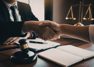 thumb-handshake-legal-meeting