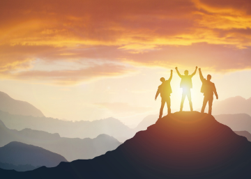 three people onto of mountain