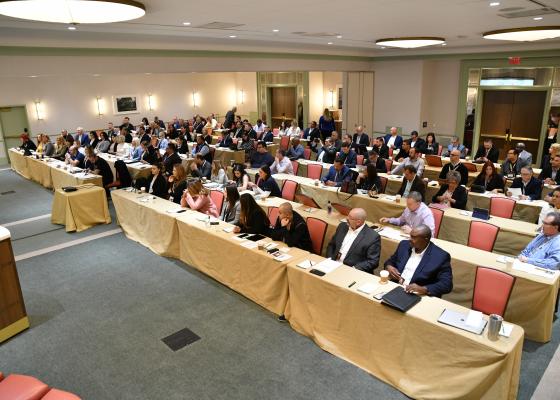 Audience in a conference room.